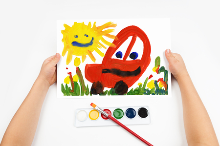 Child draws the car watercolorsの写真素材