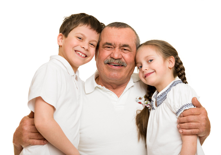 Grandfather and grandchildren portraitの写真素材
