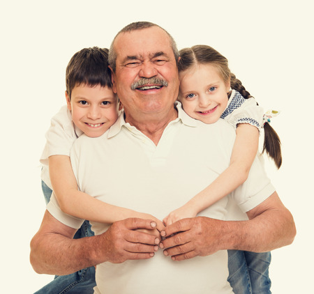 Grandfather and grandchildren portraitの写真素材