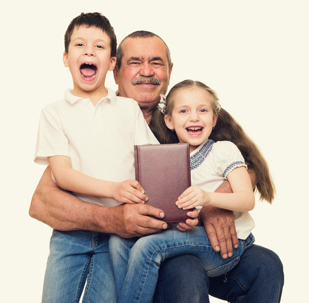 Grandfather and grandchildren portrait studio shootの写真素材