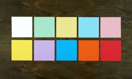 Flat lay office tools and supplies. Stationery on wood background. Flat design and top view of workspace, workplace on desk.の写真素材
