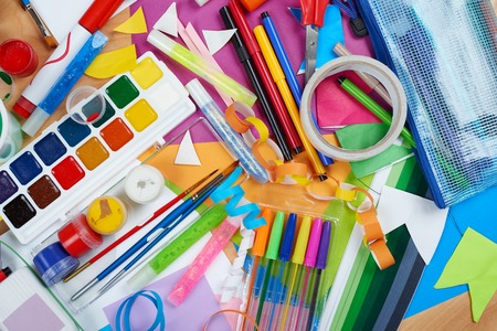 artwork workplace with creative accessories, art tools for painting and drawingの写真素材