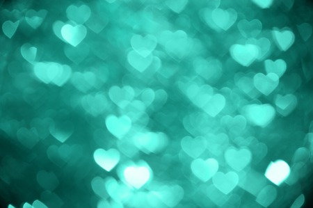 emerald heart bokeh background photo, abstract holiday backdropの写真素材