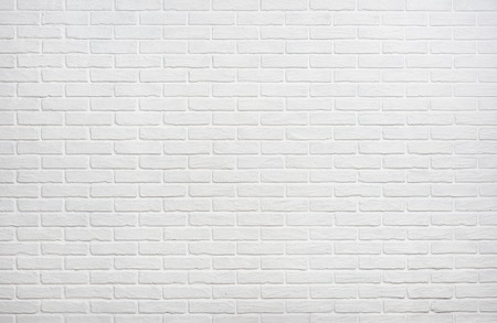 white brick wall background photoの写真素材
