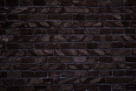 dark old brick wall for texture or backgroundの写真素材
