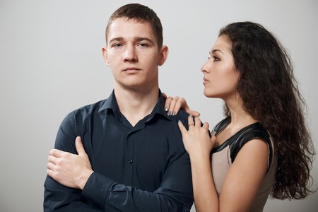 romantic couple posing on white background, love conceptの写真素材
