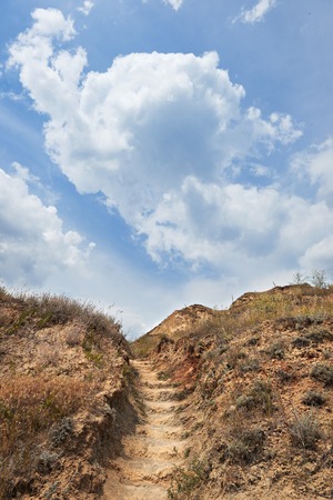 path to the sky on a high hill, beautiful coastal landscape, travel conceptの写真素材