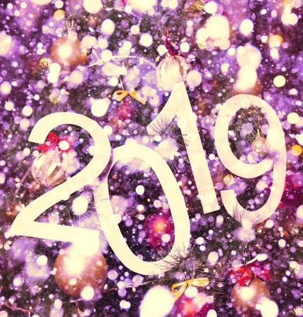 2019 abstract text on purple background of christmas tree and lights - bright holiday backdropの写真素材