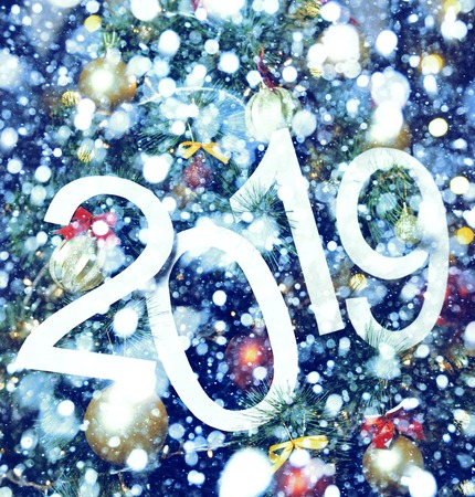 2019 abstract text on blue background of christmas tree and lights - bright holiday backdropの写真素材