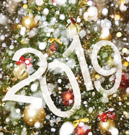 2019 abstract text on colorful background of christmas tree and lights - bright holiday backdropの写真素材