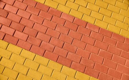 yellow and red brown paving tile for background or texture