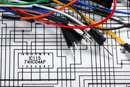 closeup of wires on circuit scheme - concept of learning, training and development of electric circuitsの写真素材