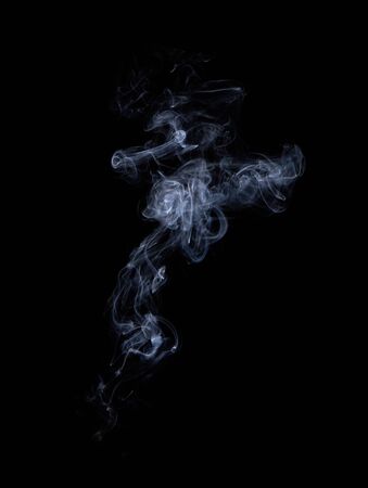 Photo of real white smoke on black backgroundの写真素材