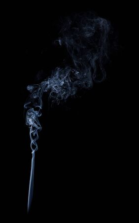 Photo of real white smoke on black backgroundの写真素材