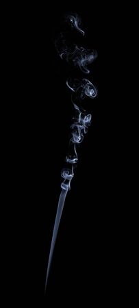 Photo of real white smoke on black backgroundの写真素材