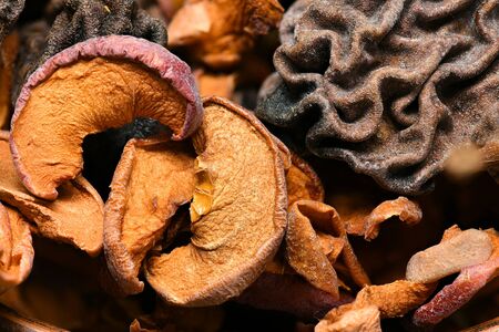 food as a background - whole grain wheat bagels with dried fruitsの写真素材