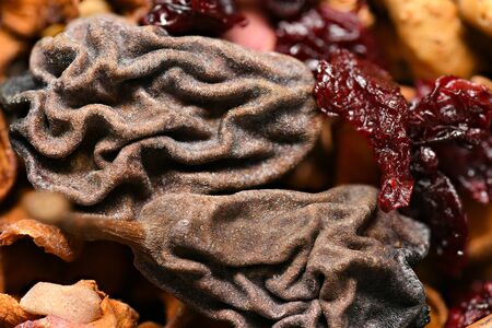 food as a background - whole grain wheat bagels with dried fruits