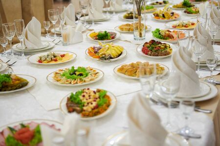 a table set in the restaurant, food and drinkの写真素材