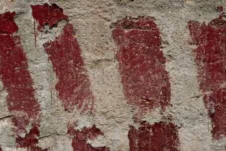 red stripes painted on the concrete as a warning and an indication of the size and limits as...