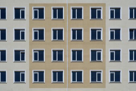 facade of a new multi-storey building with many windows