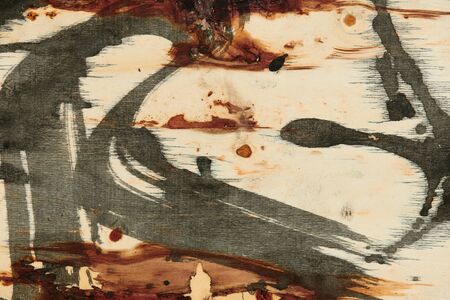 abstract grunge background, artistic painting with black paint on a light wooden background,...
