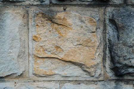 old stone wall as backgroundの写真素材