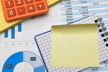 business office desk closeup - financial reports, analysis and accounting, set of documents, tables...