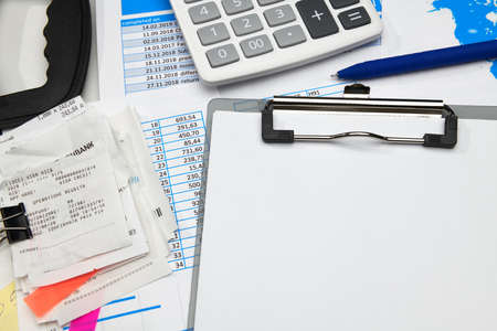 business office desk closeup - financial reports, analysis and accounting, set of documents, tables...