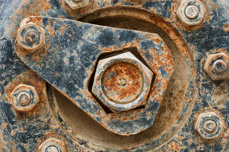 big wheel close view of old tractor as background