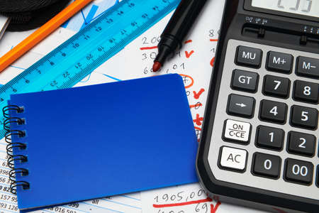 business office desk closeup - financial reports, analysis and accounting, set of documents, tables...