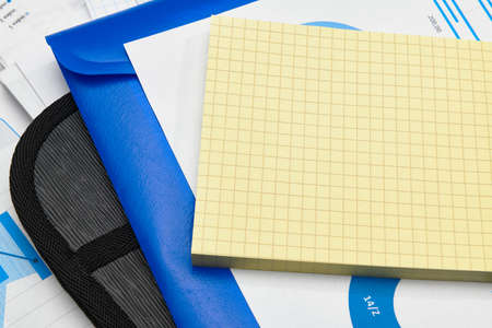 business office desk closeup - financial reports, analysis and accounting, set of documents, tables...