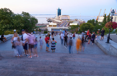 Odessa, Ukraine - August 4, 2020: view of the seaport and Potemkin stairs near the Primorskiy boulevard, walking peopleのeditorial素材