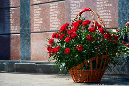 Tiraspol, Transnistria - September 2, 2020: date 30th anniversary of independence, flowers on the memorial to fallen soldiers, Russian text with different namesのeditorial素材