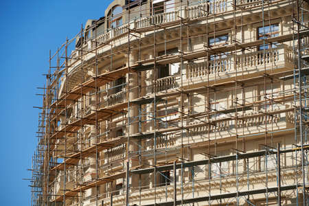 scaffolding and new building as backgroundの写真素材