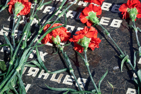 Tiraspol, Transnistria - September 2, 2020: date 30th anniversary of independence, flowers on the memorial to fallen soldiers, Russian text with different namesのeditorial素材