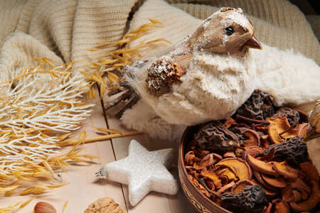 christmas decoration in rustic style and holiday background, still life on wooden backdrop, bread, nuts and otherの写真素材