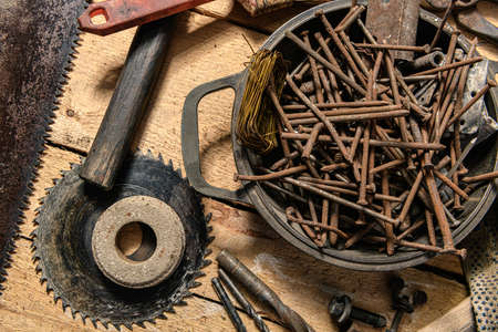 Old vintage household hand tools still life on a wooden background in a DIY and repair conceptの写真素材