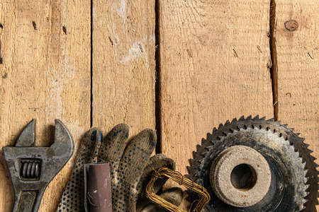 Old vintage household hand tools still life on a wooden background with copyspace and place for text