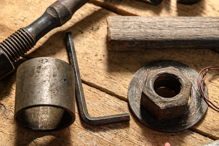 Old vintage household hand tools still life on a wooden background in a DIY and repair conceptの写真素材