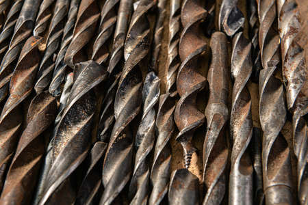 old vintage hand tools - set of drills on a wooden background