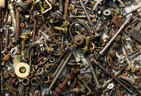 background from old vintage hand tools - set of different screws and nuts