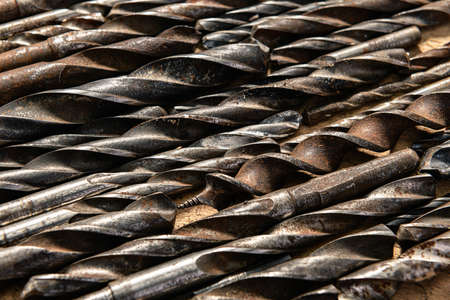 old vintage hand tools - set of drills on a wooden backgroundの写真素材