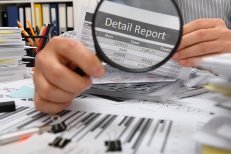 business concept - businessman working with reports in office, table and workspace close view,...