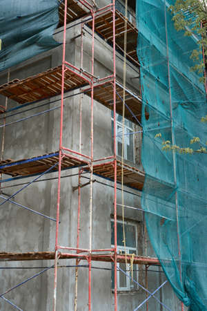 renovation or repair of a building facade using scaffolding