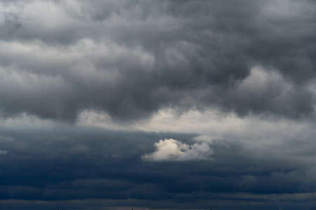 beautiful dark dramatic sky with stormy clouds before the rainの写真素材