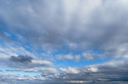 beautiful blue sky and bright clouds as abstract backgroundの写真素材
