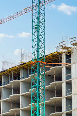 construction of a modern high-rise building, the creation of a concrete frame, building materials...