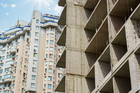 construction of a modern high-rise building, concrete frame and building materialsの写真素材