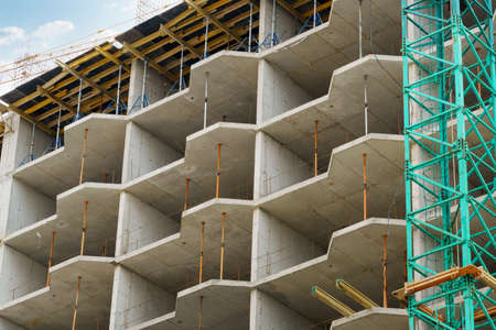 construction of a modern high-rise building of residential complex, the creation of a concrete...
