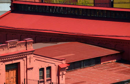 red industrial buildings, brick walls and roofs, old styleの写真素材